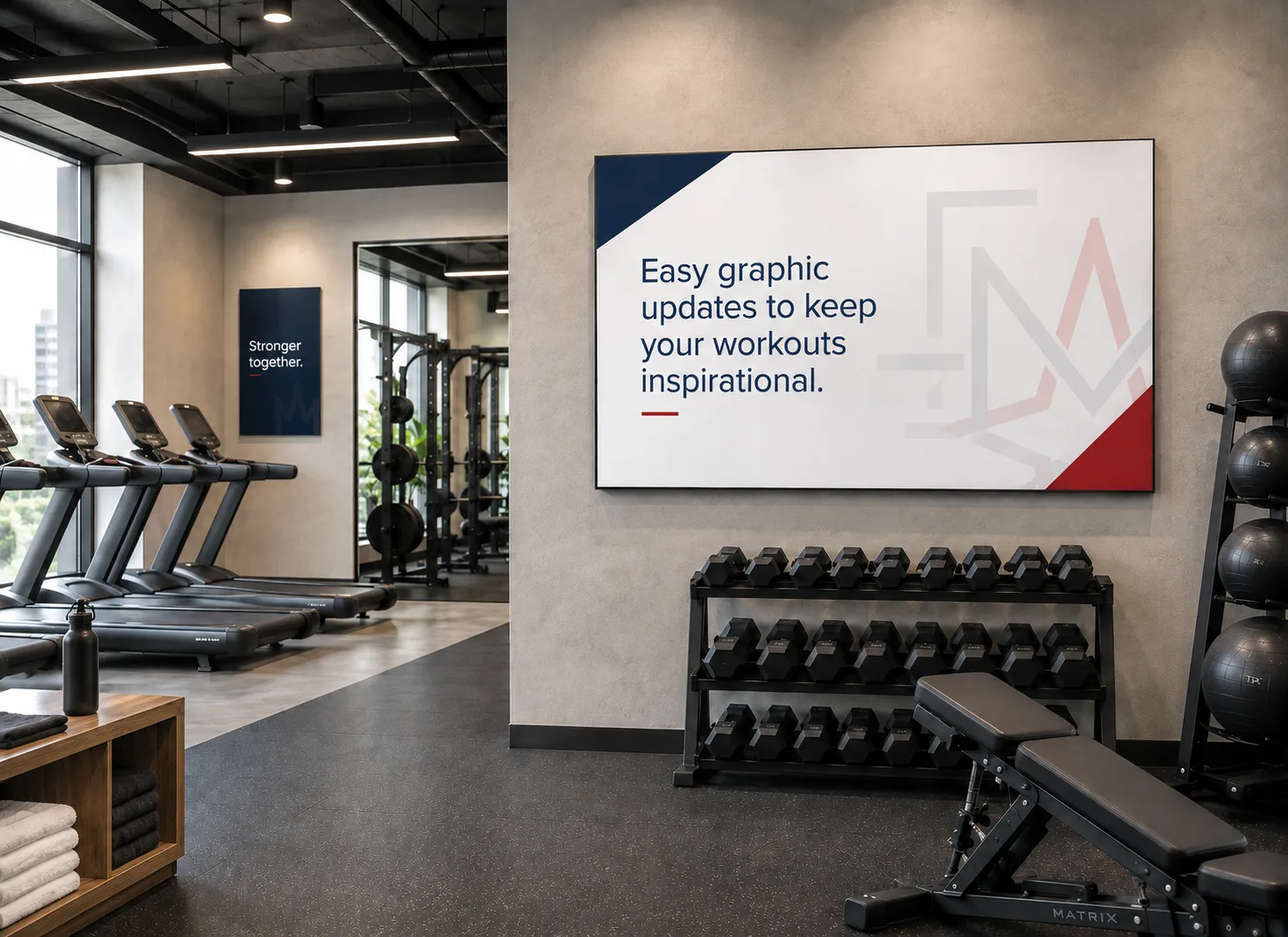 Corporate gym with a large-format wall-mounted SEG frame